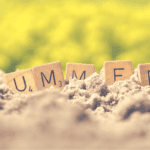 word summer spelt out with scrabble blocks